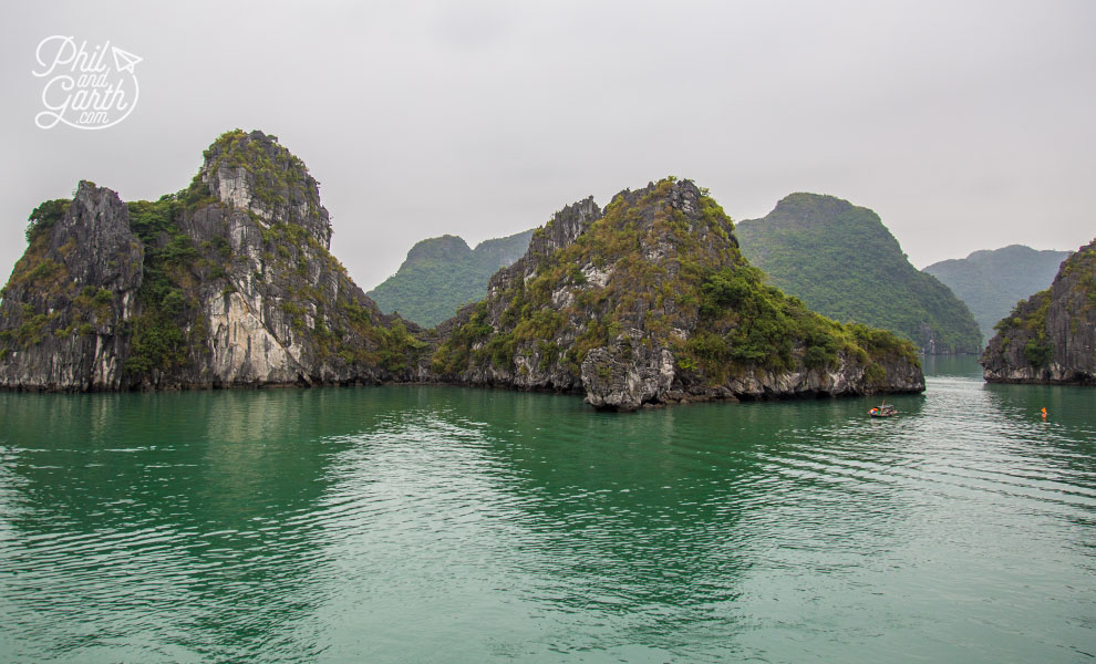 Shadows from the karsts show off the emerald green waters