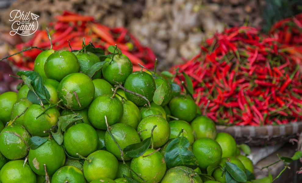 Colourful limes and chillies on sale