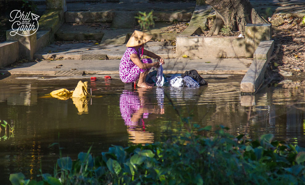 Washing clothes in the river