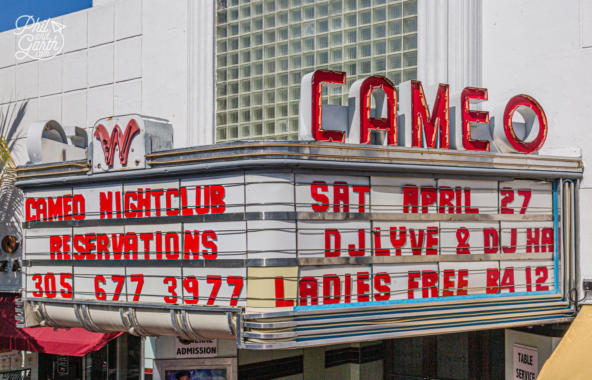 An aluminium marquee with neon signage of an old Cameo movie theatre