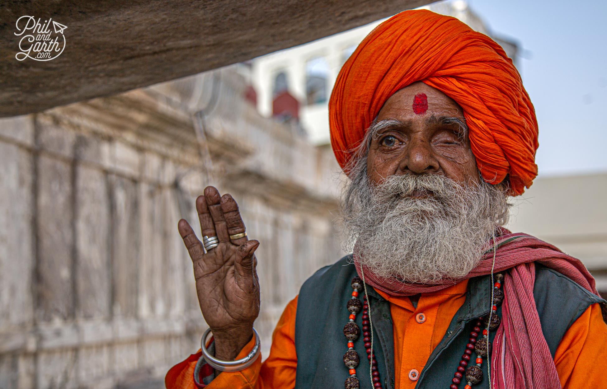 Sadhus sit outside the entrance to the Jagdish Temple. If you want to take pictures ask them first and offer some rupees 