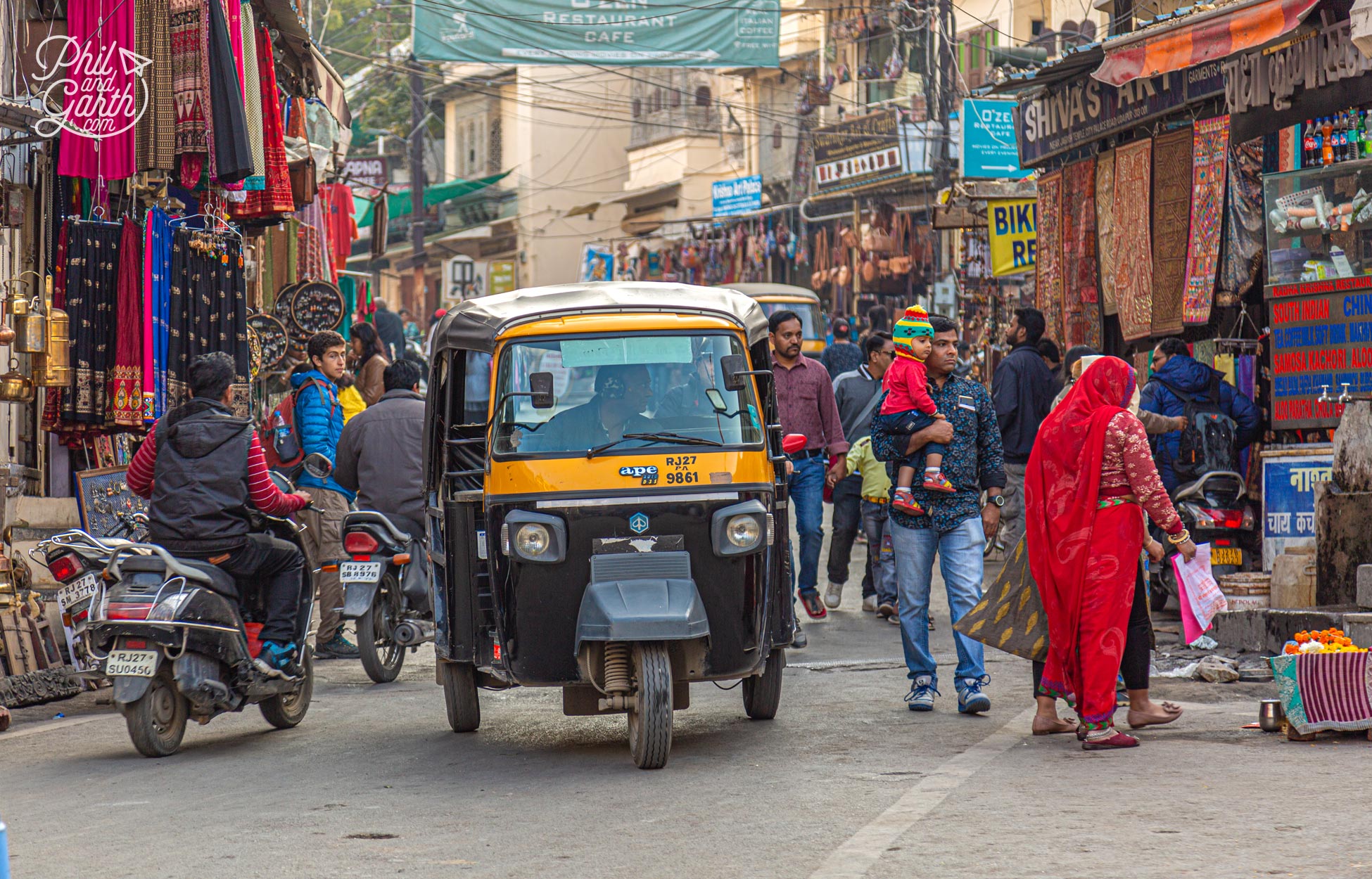 Tuk tuks vary in size by cities in India. In Udaipur they are bigger and can seat 3 people