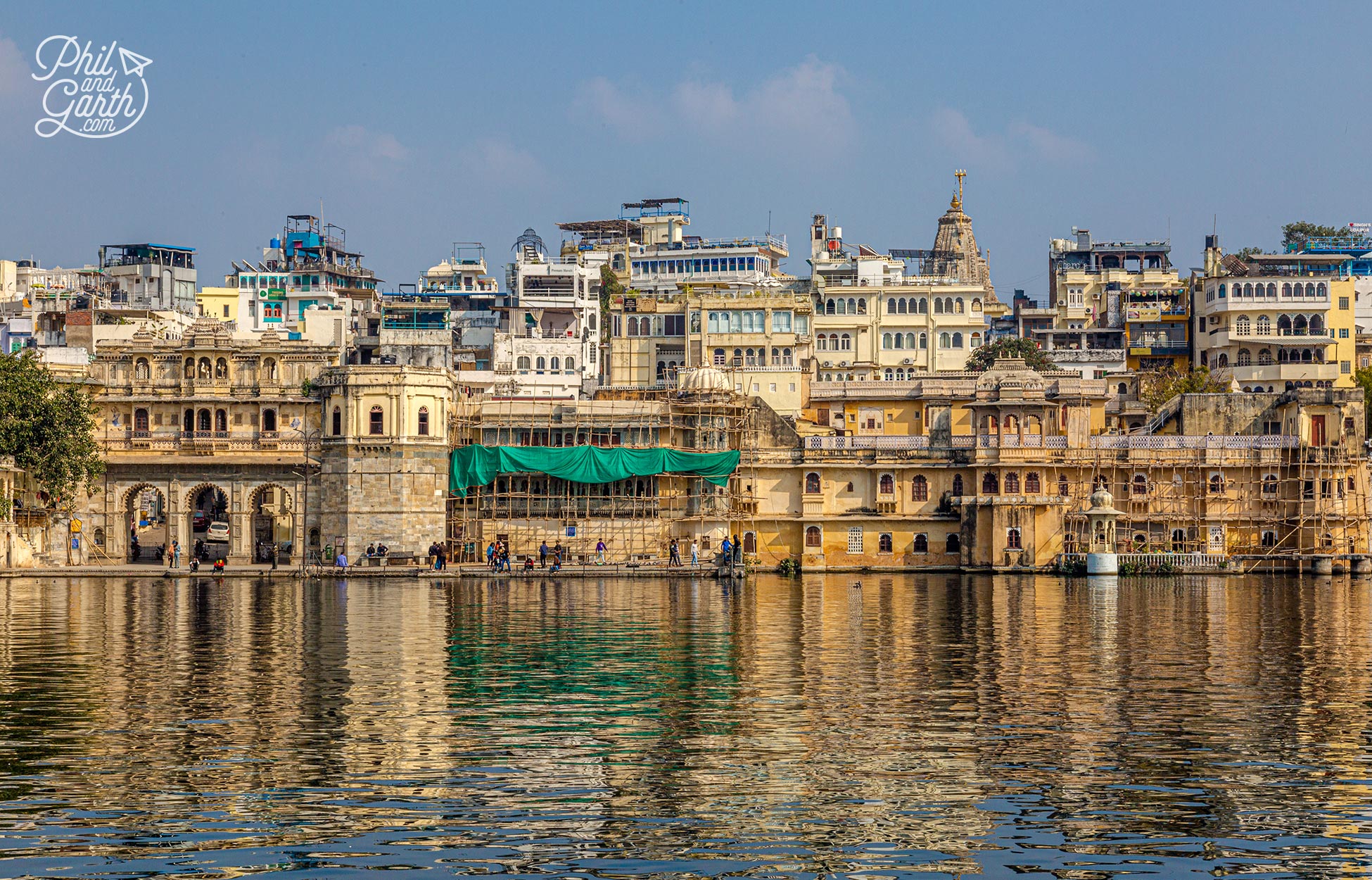 View of Gangaur Ghat with shimmering reflections in the lake