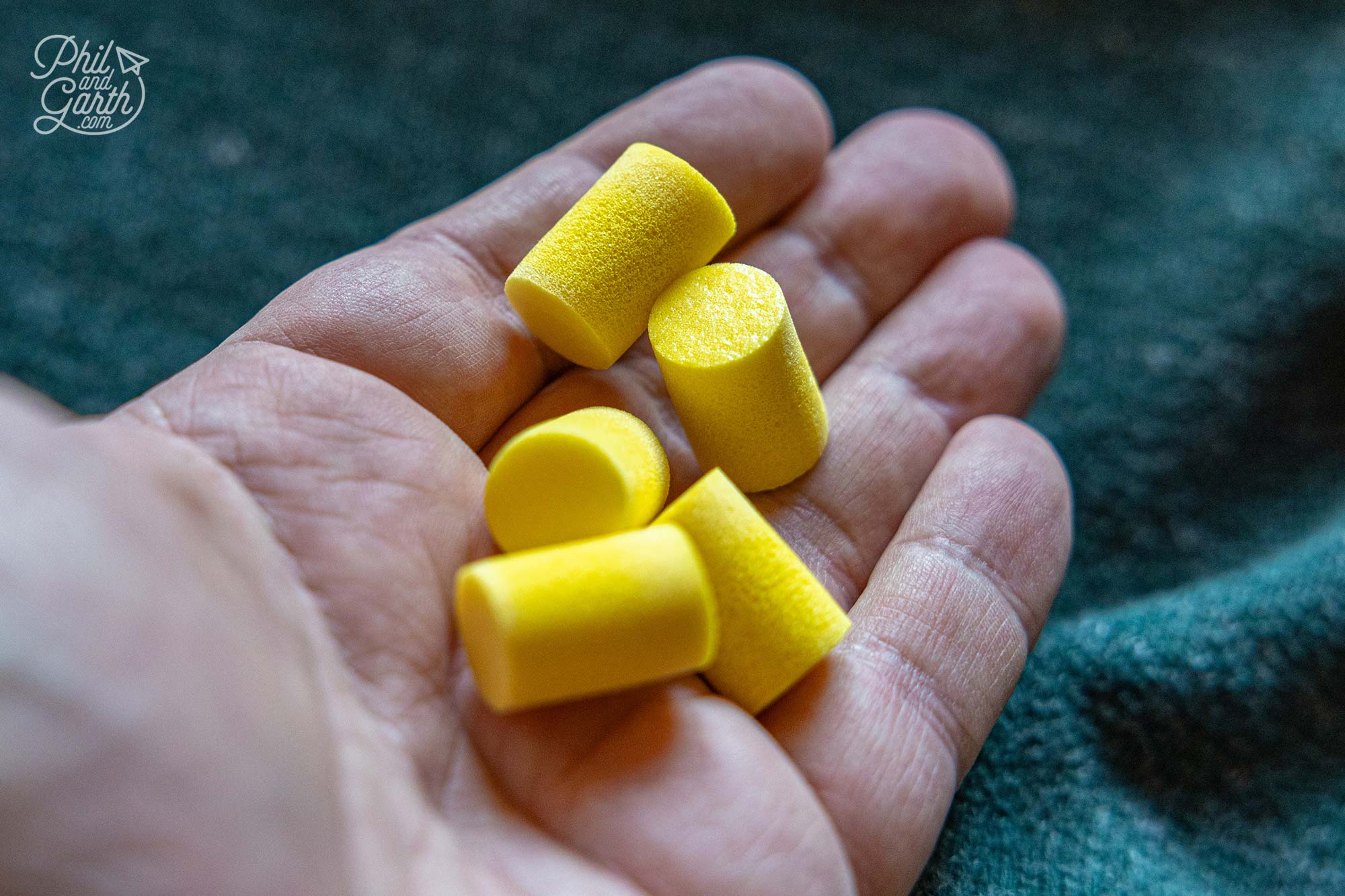 Buy these kind of thick ear plugs for a good night sleep