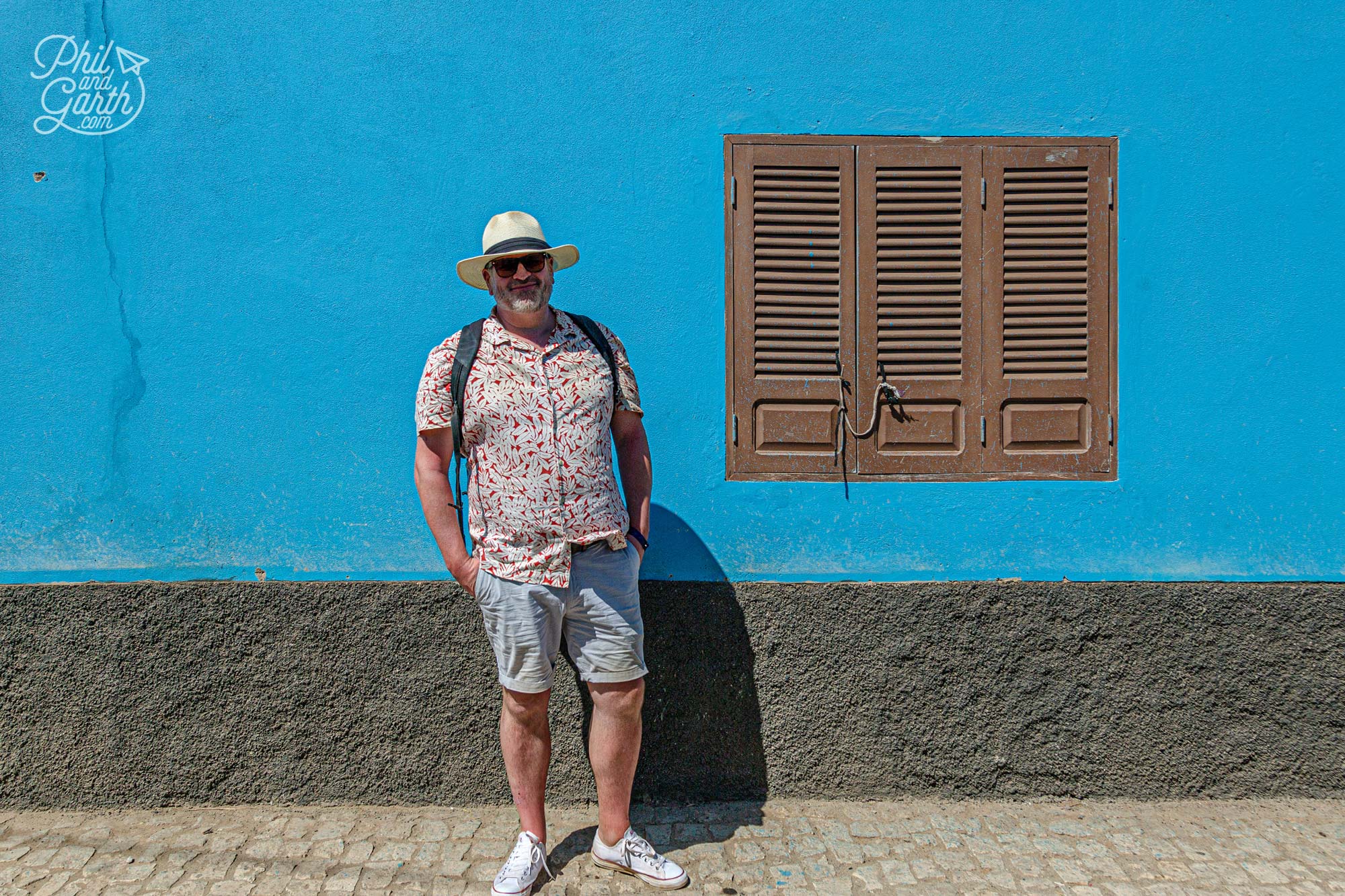 Phil with an olympic blue wall