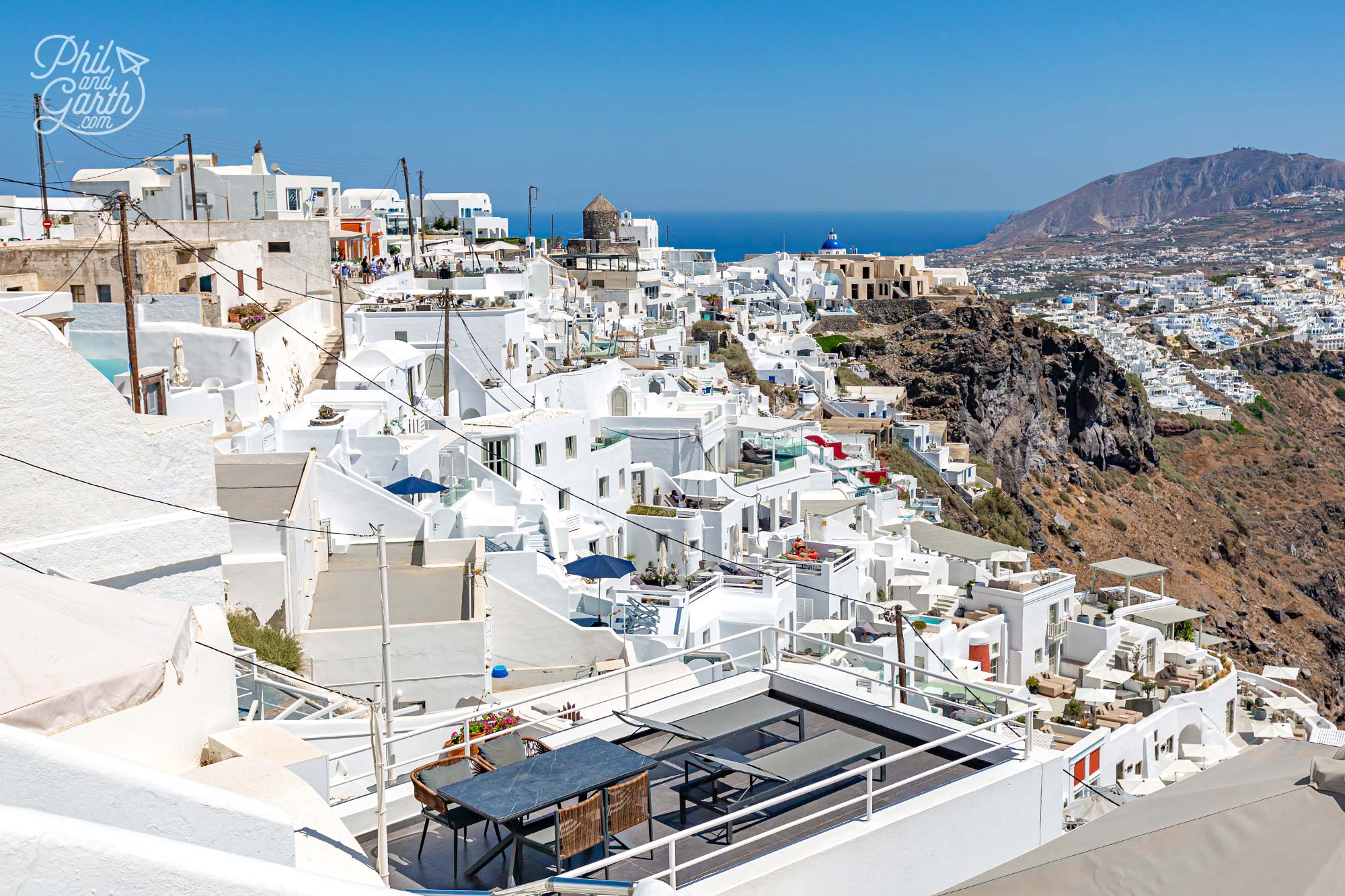 Santorini, Greece: picturesque cliffs, whitewashed buildings, and stunning sunsets over the Aegean Sea
