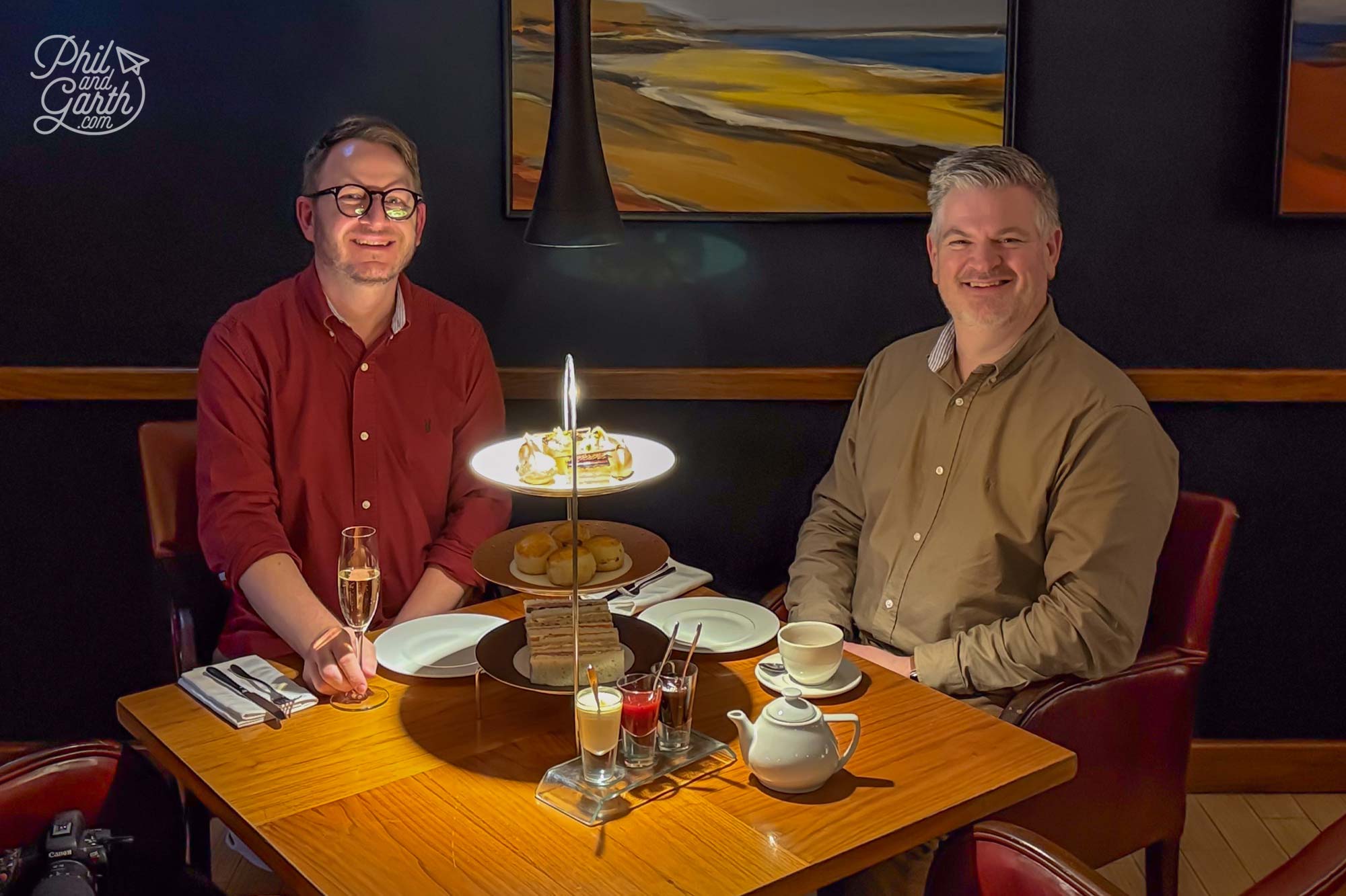 Garth and Phil enjoying an afternoon tea in Jersey