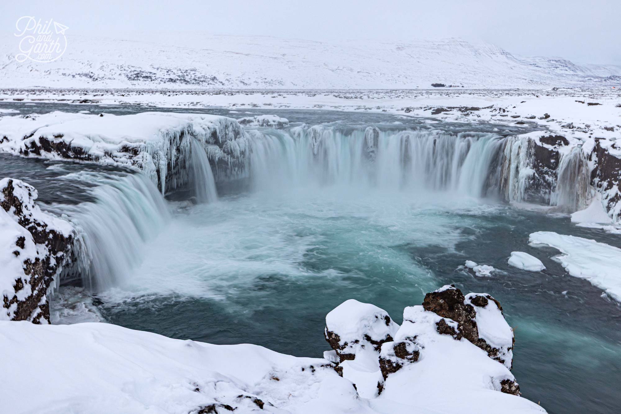 Iceland’s stunning Goðafoss waterfall in a winter wonderland