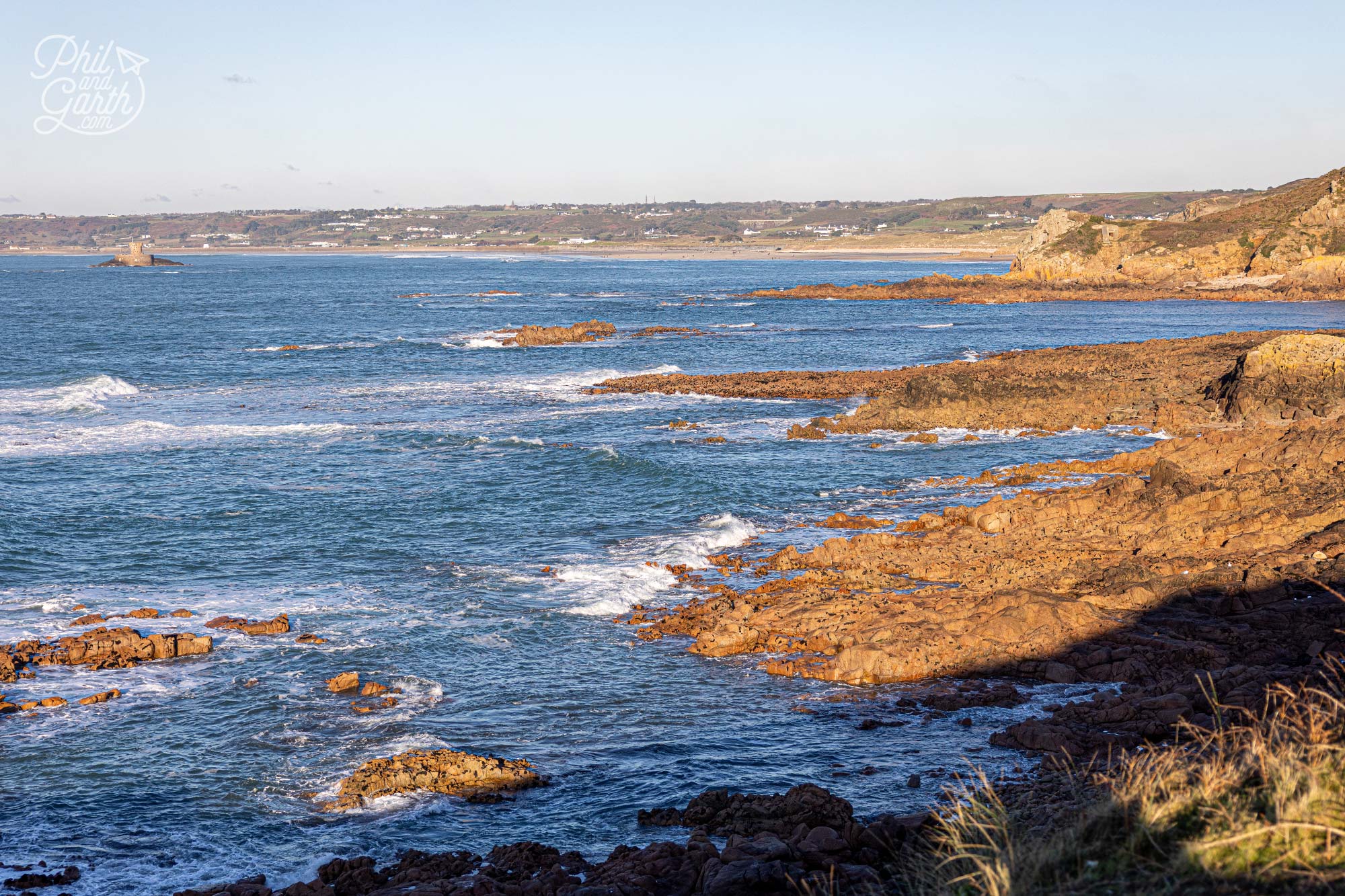 Looking the other way towards Le Braye with La Rocco Tower in the sea